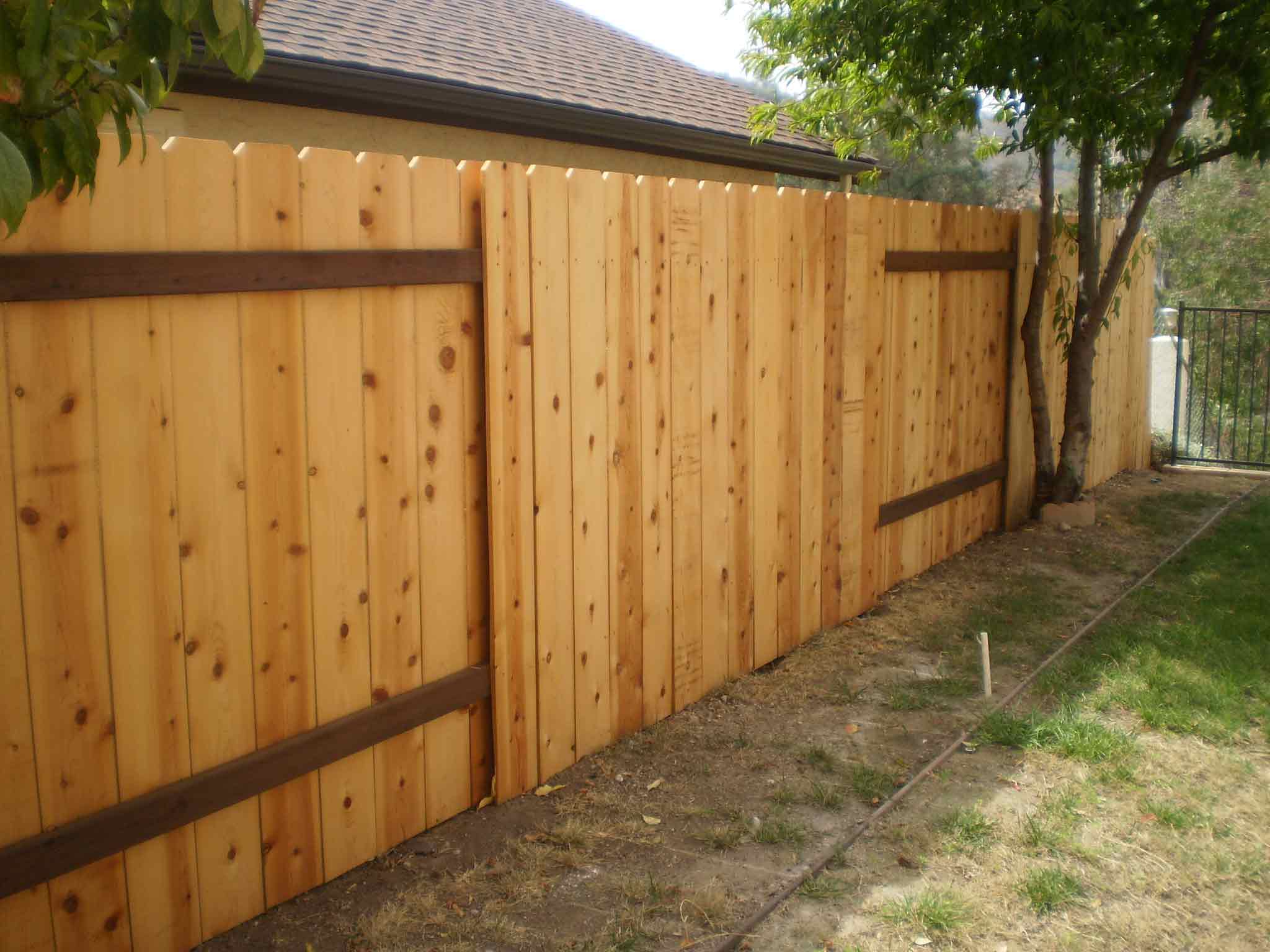 backyard wood fence photo - 1