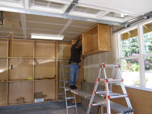 garage ladder storage photo - 2