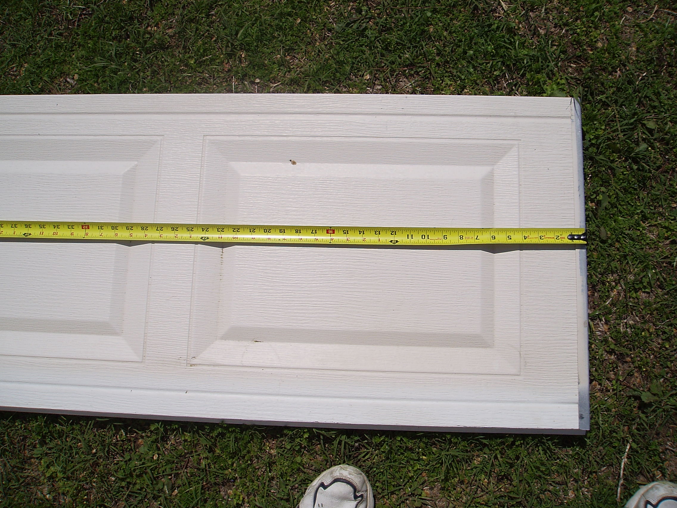 how to repair a garage door panel photo - 2