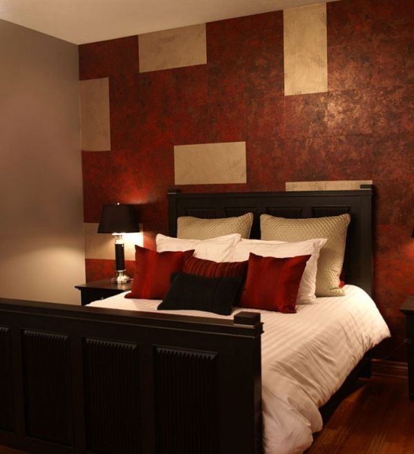 red accent wall bedroom photo - 2