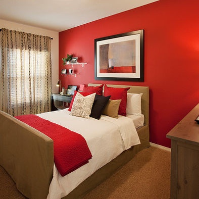 red accent wall in bedroom photo - 1